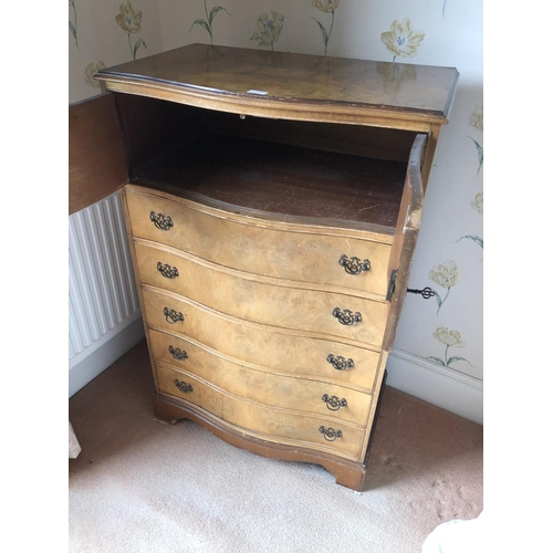 260 - A serpentine walnut gentlemans tallboy, cupboard top over five drawers 78x50x123