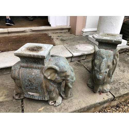 268 - A pair of terracotta Indian elephant seats 40cm high