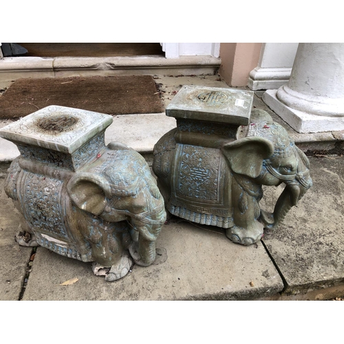 268 - A pair of terracotta Indian elephant seats 40cm high