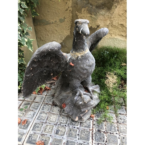 270 - A stone eagle figure (repaired)