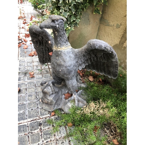 270 - A stone eagle figure (repaired)