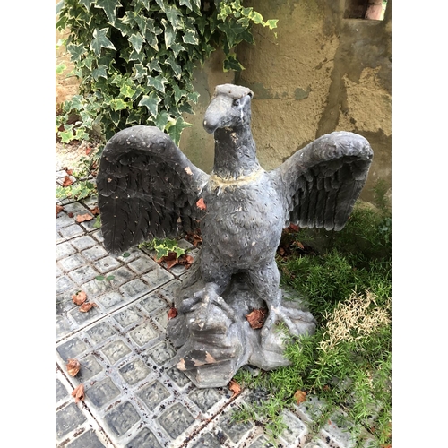 270 - A stone eagle figure (repaired)