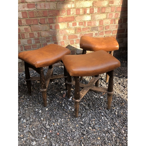 280 - A see today three tan brown leather topped stools