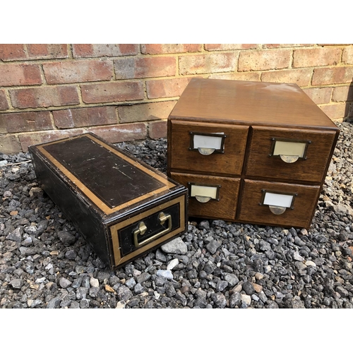 281 - A chest of four oak filing drawers together with a cashiers drawer