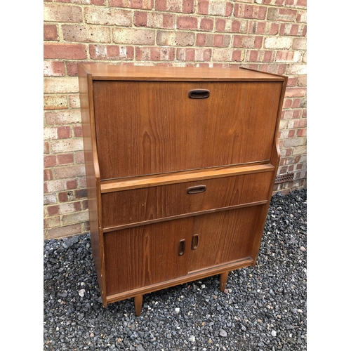 288 - A mid century teak bureau with drop down front