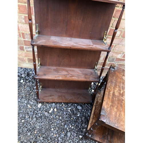 291 - A open fronted mahogany wall mounted bookshelf together with a rosewood trolley (AF)