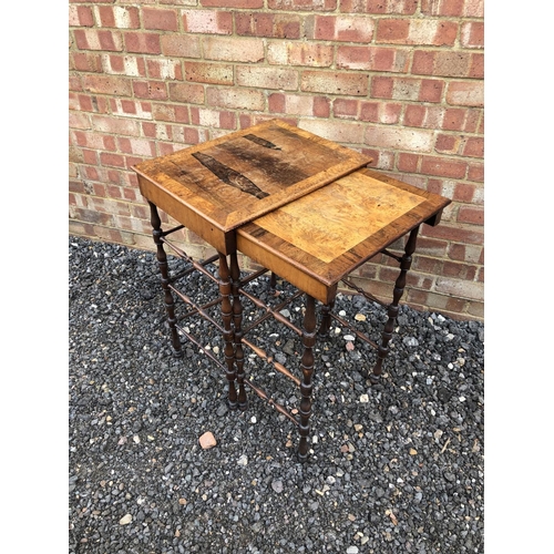 294 - A walnut nest of two tables