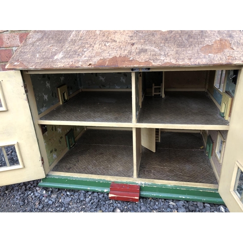 302 - A 19th century dolls house with open up front