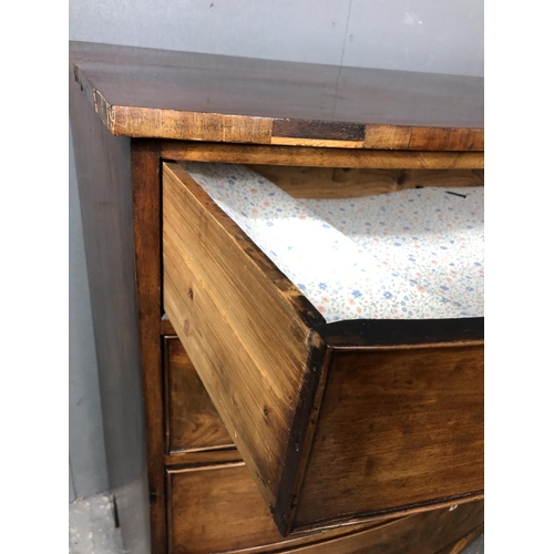 322 - A Victorian mahogany bow fronted chest of four long drawers with brass drop handles 104x50x104