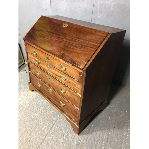 323 - A Victorian mahogany bureau with a fitted interior above four drawers 92x50x98