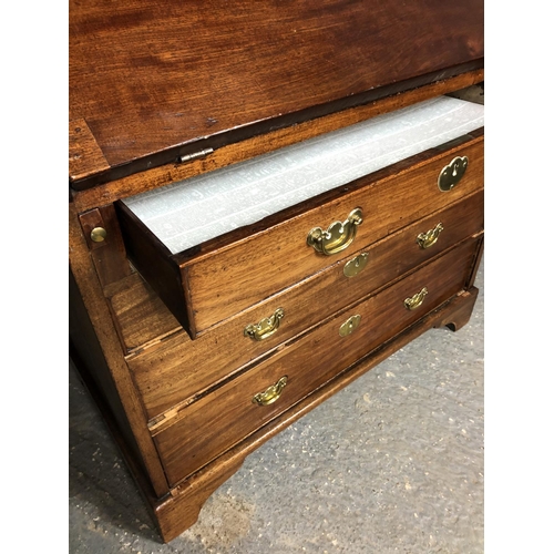 323 - A Victorian mahogany bureau with a fitted interior above four drawers 92x50x98