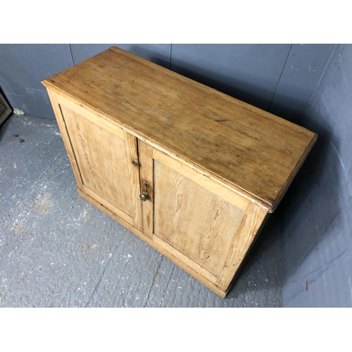 330 - A country pine two door larder cupboard with a single shelf 100x40x77