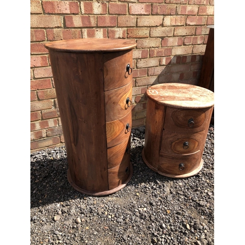 359 - Two cylindrical teak chests, one three drawer and one five drawer