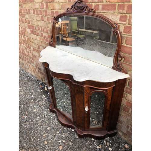 362 - A Victorian walnut credenza with mirror panel doors and a mirror back