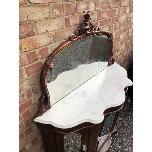 362 - A Victorian walnut credenza with mirror panel doors and a mirror back