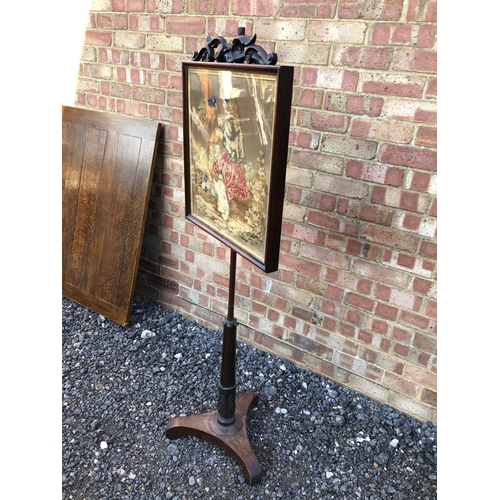 37 - A Victorian mahogany tapestry pole screen