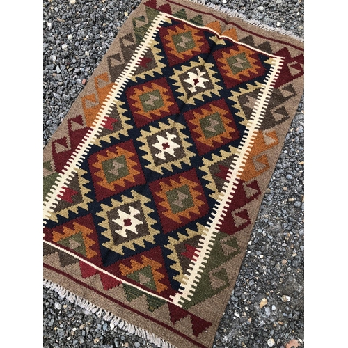 380 - A brown maimana Kilim 127x81