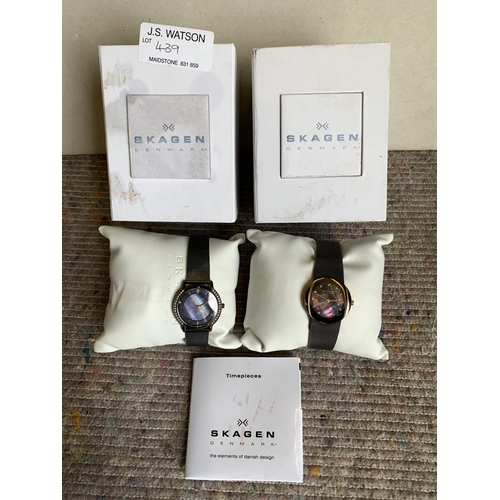 439 - Two boxes Skagen Ladies watches, box and certificates