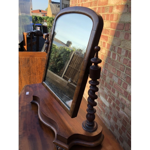 44 - A mahogany swing mirror