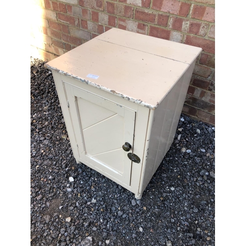 45 - A small painted single door cupboard