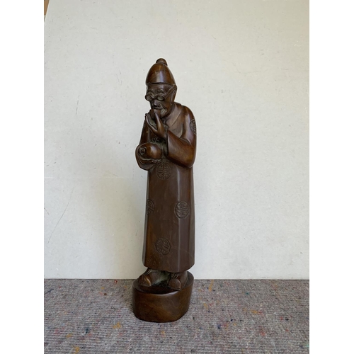 451 - Carved wooden chinese figure, 40cm tall