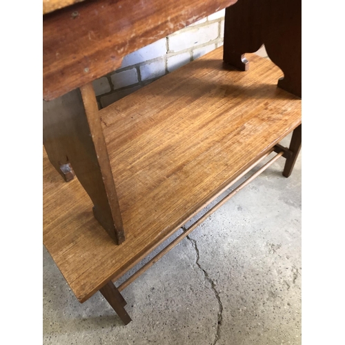 64 - A mid century teak coffee table with slatted under tier, together with another stool