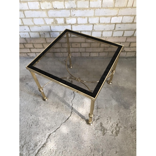 66 - A brass coffee table with a smoked glass top