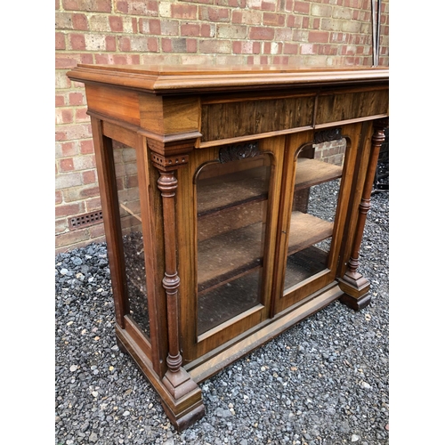 7 - A continental style walnut two door cabinet 107x45x97