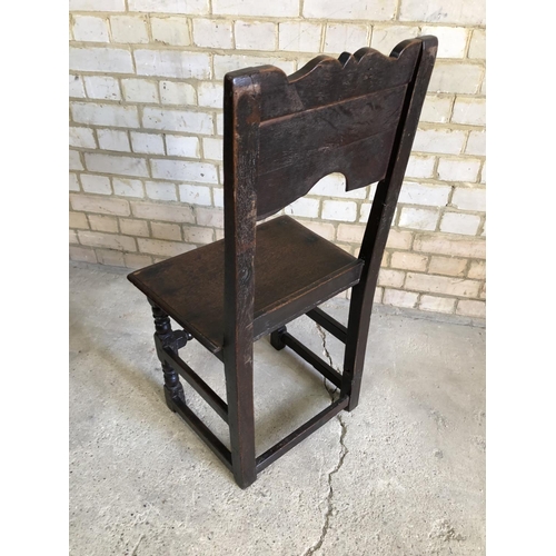 70 - An oak hall chair