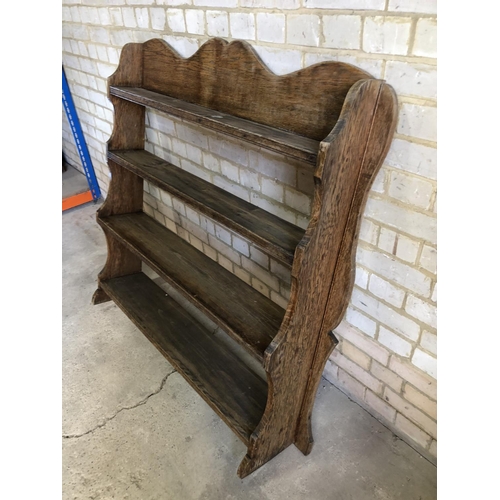 72 - A French oak wall hanging plate rack