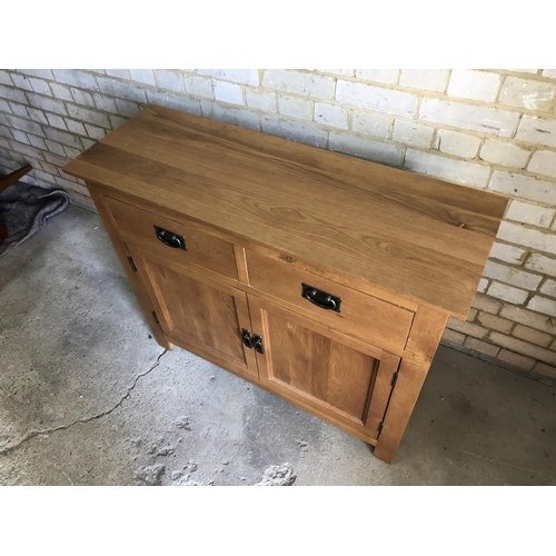 82 - A light oak two drawer over two cupboard sideboard 100x36x86