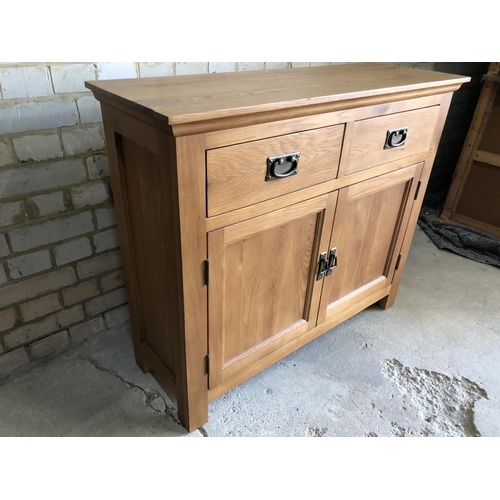 82 - A light oak two drawer over two cupboard sideboard 100x36x86