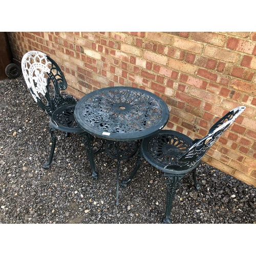 91 - A green aluminium garden table and two chairs