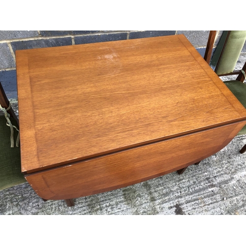 95 - A Nathan teak dining table and two chairs