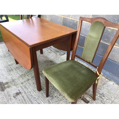 95 - A Nathan teak dining table and two chairs