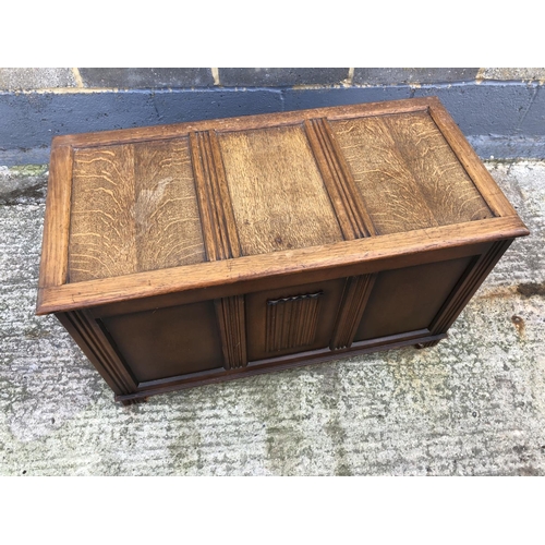 96 - An oak three panel blanket box 98x48x52