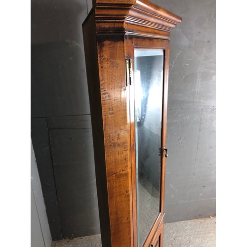 58 - A reproduction oak corner cabinet