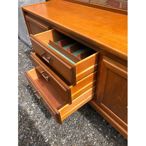 219 - A teak sideboard by William Lawrence