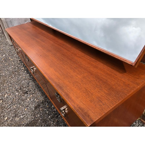 220 - A six drawer teak sidebaord by Austin suite