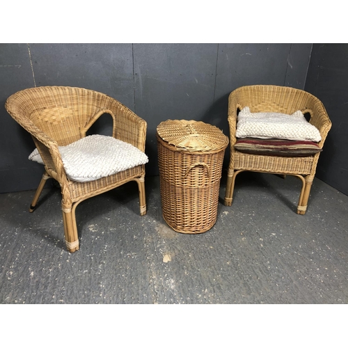 2 - A pair of wicker chairs together with a wicker linen basket