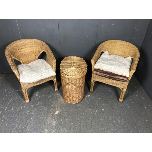 2 - A pair of wicker chairs together with a wicker linen basket