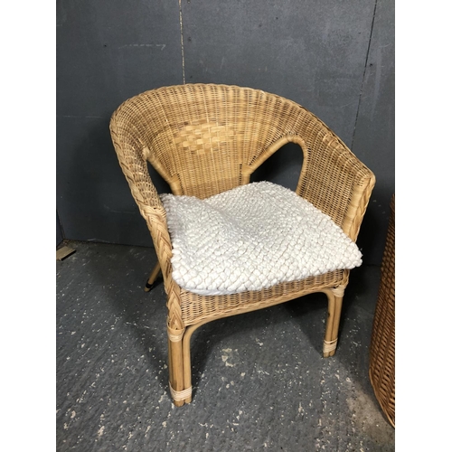 2 - A pair of wicker chairs together with a wicker linen basket