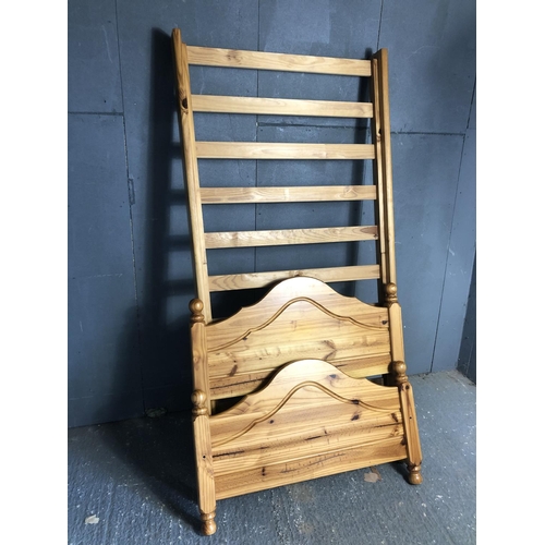 20 - A solid pine single bed frame