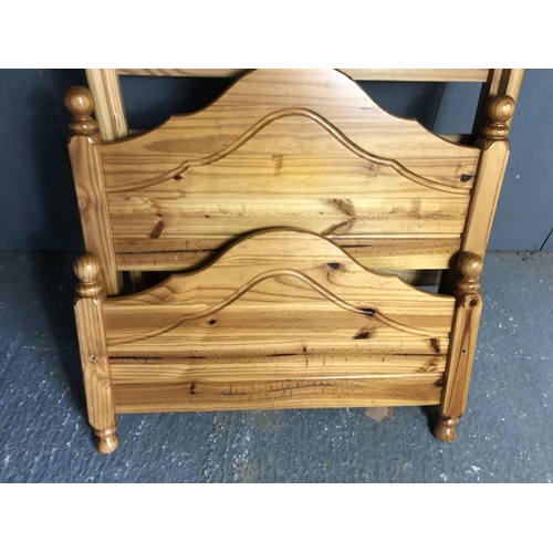 20 - A solid pine single bed frame