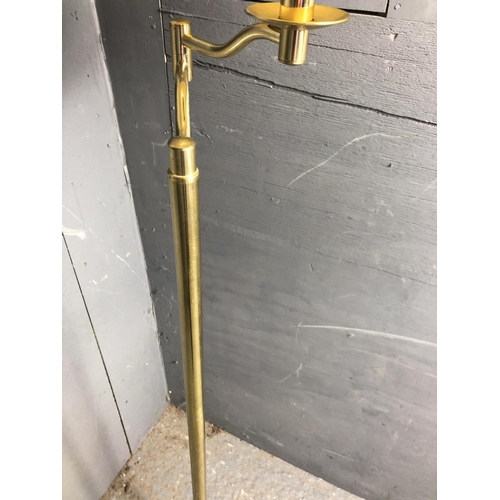 24 - A brass floor standing adjustable lamp