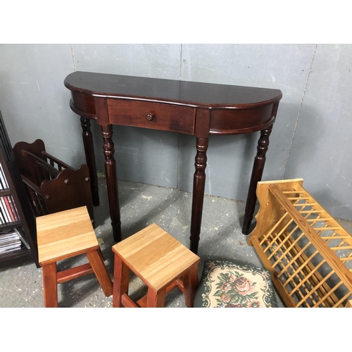 3 - A reproduction hall table together with three stools, magazine rack, cd rack and pine wall rack