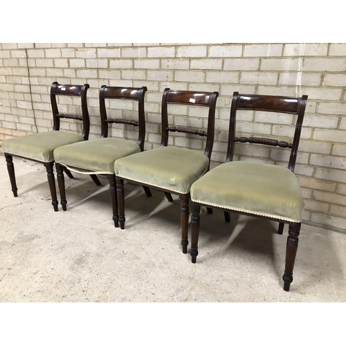 41 - A set of four Mahogany dining chairs with rope twist back and green upholstered seats