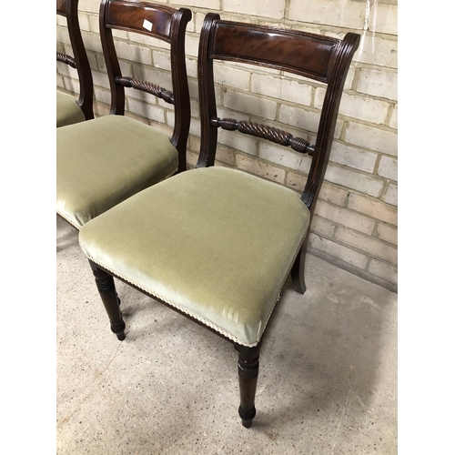 41 - A set of four Mahogany dining chairs with rope twist back and green upholstered seats