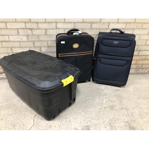 49 - Two suitcases and a large plastic trunk