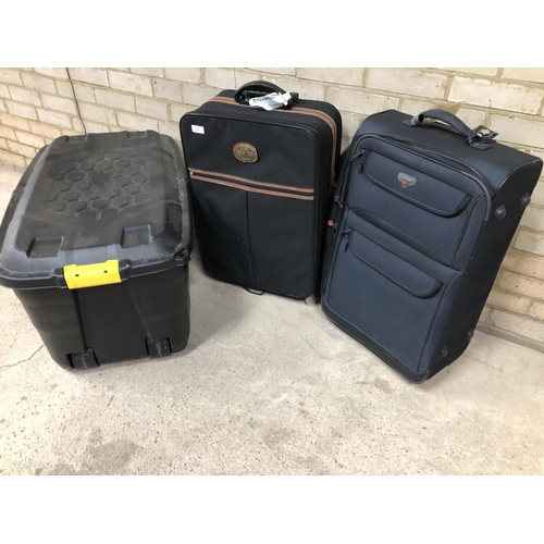 49 - Two suitcases and a large plastic trunk